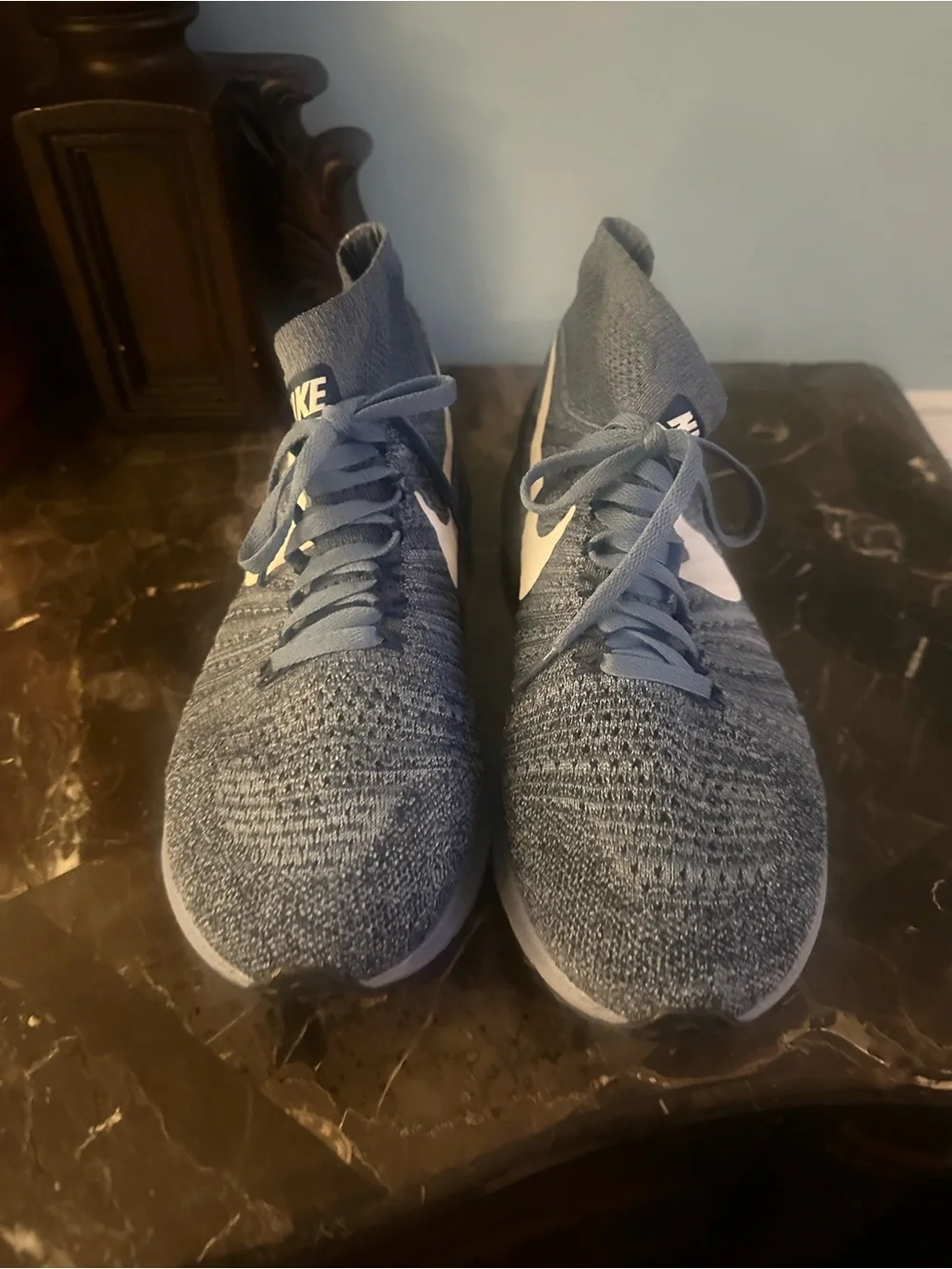 Nike Men’s Blue Flyknit Mid-Top Sneakers with White Swoosh